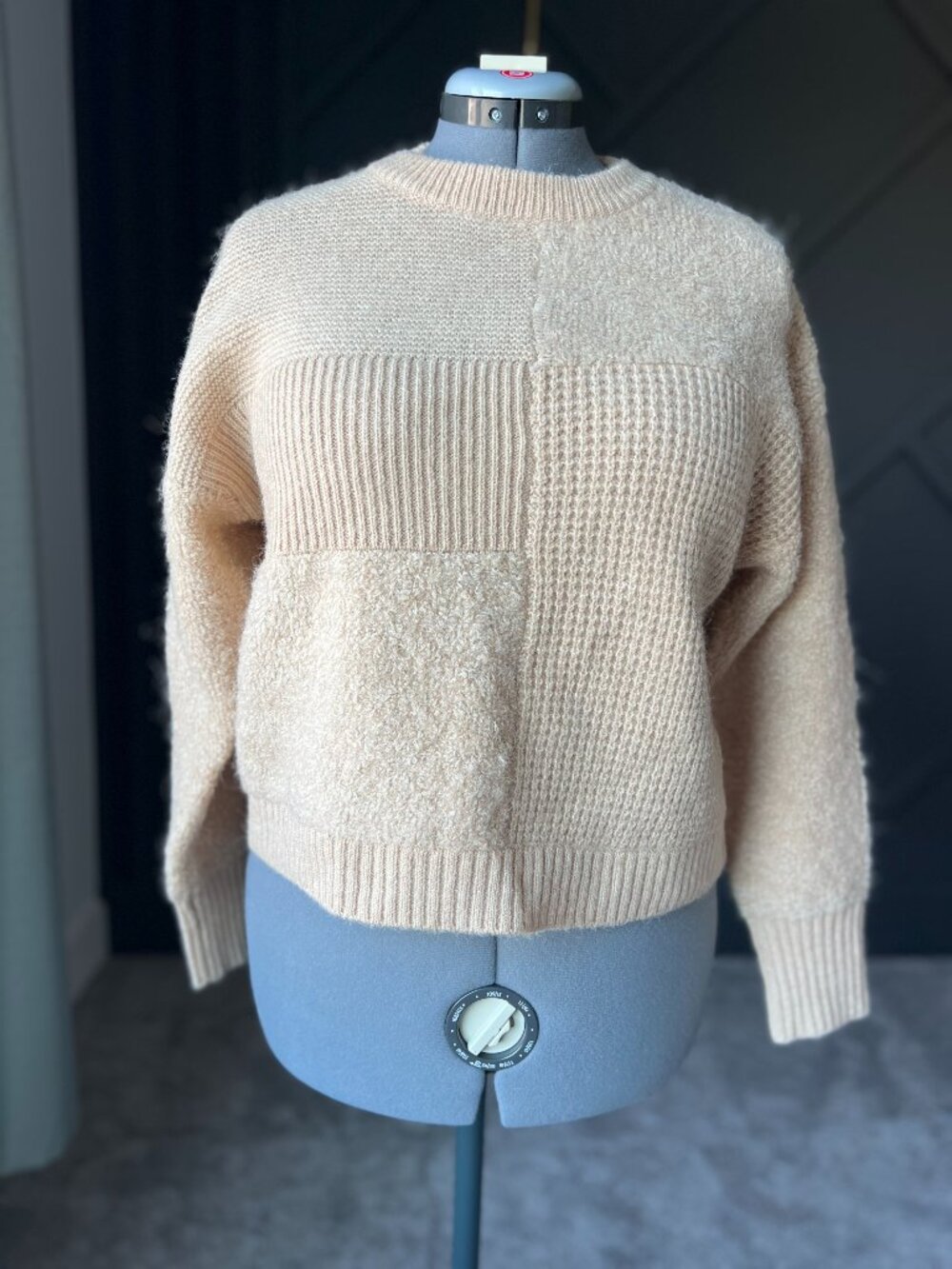 Wool-blend sweater with geometric pattern in sand